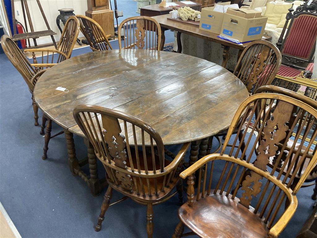 A set of eight 19th century and later Yorkshire area yew, elm and ash Windsor armchairs